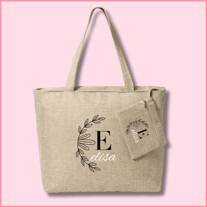 Bolsa de tela elegante con neceser personalizada con una imagen de una semi corona de hojas y nombre e inicial