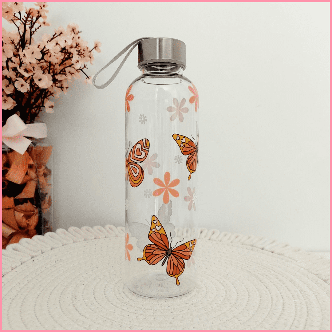 Botella de plástico duro con diseño de mariposas y flores