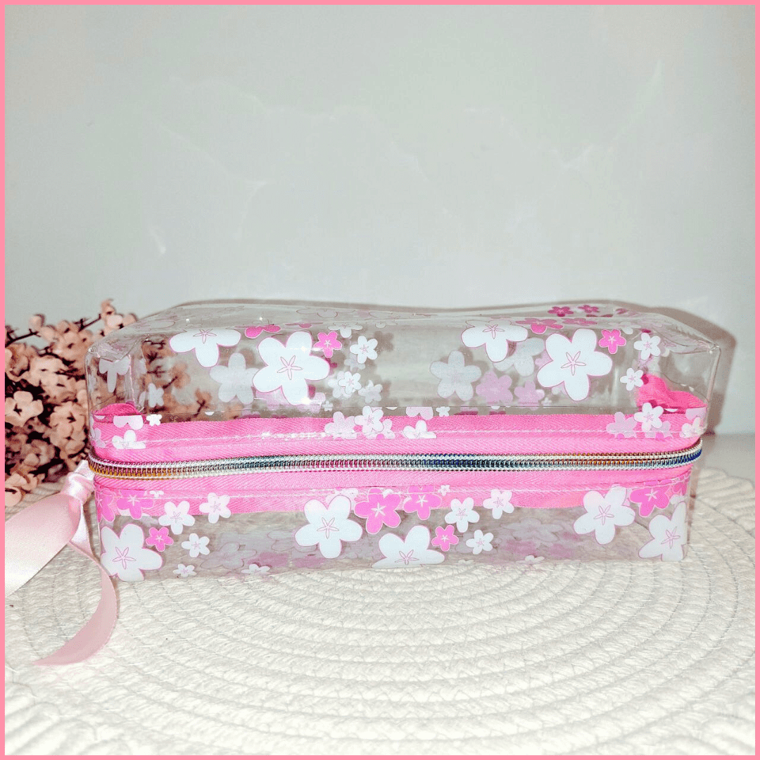 Estuche escolar transparente personalizado con  flores Sakura y un nombre de tu elección