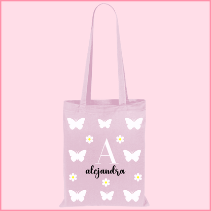 Tote bag de algodón rosa personalizada con la inicial y el nombre mariposas y margaritas